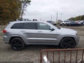 2015 Jeep Grand Cherokee — photo 13 of 16 | VIN 1C4RJFAG4FC697019