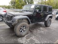 2016 Jeep Wrangler Unlimited — photo 2 of 20 | VIN 1C4BJWDG9GL323794
