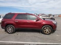 2015 GMC Acadia — photo 13 of 16 | VIN 1GKKRRKD3FJ112236