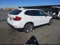 2014 BMW X1 — photo 4 of 16 | VIN WBAVM1C50EVW51112