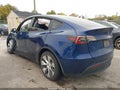 2024 Tesla Model Y — photo 3 of 18 | VIN 7SAYGDEE6RA249105
