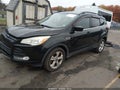 2015 Ford Escape — photo 2 of 16 | VIN 1FMCU9G9XFUC30779