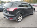 2015 Ford Escape — photo 4 of 16 | VIN 1FMCU9G9XFUC30779