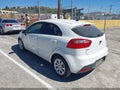 2012 Kia Rio — photo 3 of 18 | VIN KNADM5A3XC6054755