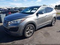 2016 Hyundai Santa Fe — photo 2 of 16 | VIN 5XYZT3LB1GG351808