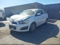 2014 Chevrolet Sonic — photo 2 of 11 | VIN 1G1JC5SH8E4107396