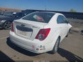 2014 Chevrolet Sonic — photo 4 of 11 | VIN 1G1JC5SH8E4107396