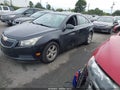 2014 Chevrolet Cruze — photo 2 of 16 | VIN 1G1PC5SB2E7136879