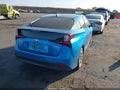 2021 Toyota Prius — photo 4 of 16 | VIN JTDKAMFU2M3136643