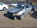 2009 Kia Spectra — photo 2 of 12 | VIN KNAFE222495641378