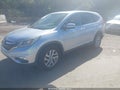 2016 Honda CR-V — photo 2 of 16 | VIN 2HKRM4H5XGH639356