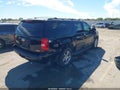 2013 Chevrolet Suburban 1500 — photo 4 of 16 | VIN 1GNSCHE03DR100562