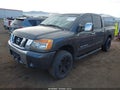 2011 Nissan Titan — photo 2 of 20 | VIN 1N6BA0EK7BN307135
