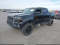 2012 Toyota Tacoma — photo 2 of 17 | VIN 3TMLU4EN2CM081372