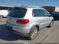 2013 Volkswagen Tiguan — photo 4 of 20 | VIN WVGAV7AX7DW502870