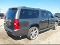 2010 Chevrolet Suburban 1500 — photo 4 of 11 | VIN 1GNUCHE05AR145944