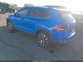 2024 Volkswagen Taos — photo 3 of 16 | VIN 3VVEX7B26RM064838