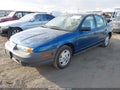 2000 Saturn Sl — photo 2 of 12 | VIN 1G8ZF5285YZ240622