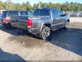 2016 Toyota Tacoma — photo 4 of 16 | VIN 3TMCZ5AN3GM010622