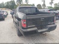 2013 Honda Ridgeline — photo 3 of 16 | VIN 5FPYK1F57DB010769