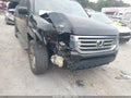 2013 Honda Ridgeline — photo 6 of 16 | VIN 5FPYK1F57DB010769