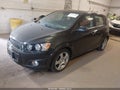 2014 Chevrolet Sonic — photo 2 of 11 | VIN 1G1JE6SB2E4131771