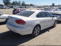 2014 Volkswagen Passat — photo 4 of 11 | VIN 1VWCN7A30EC093458