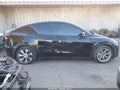 2022 Tesla Model Y — photo 13 of 18 | VIN 7SAYGAEE0NF486796