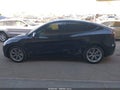 2022 Tesla Model Y — photo 14 of 18 | VIN 7SAYGAEE0NF486796
