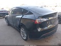 2022 Tesla Model Y — photo 3 of 18 | VIN 7SAYGAEE0NF486796