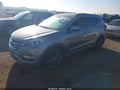 2018 Hyundai Santa Fe — photo 2 of 16 | VIN 5NMZU4LA5JH084678