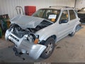 2003 Ford Escape — photo 2 of 19 | VIN 1FMCU94103KC46253