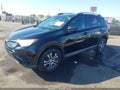 2018 Toyota RAV4 — photo 2 of 3 | VIN 2T3ZFREV1JW432205