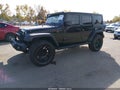 2017 Jeep Wrangler Unlimited — photo 2 of 16 | VIN 1C4HJWDG1HL547444