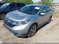 2018 Honda CR-V — photo 2 of 11 | VIN 5J6RW1H52JA002673