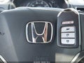 2015 Honda CR-V — photo 11 of 17 | VIN 2HKRM3H50FH528291