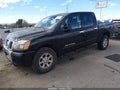 2006 Nissan Titan — photo 2 of 11 | VIN 1N6AA07B26N546025