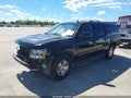 2012 Chevrolet Suburban 1500 — photo 2 of 16 | VIN 1GNSCJE04CR211272