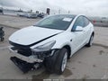 2023 Tesla Model Y — photo 2 of 18 | VIN 7SAYGDEE7PA037486