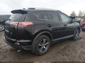 2018 Toyota RAV4 — photo 4 of 17 | VIN 2T3RFREV5JW849441