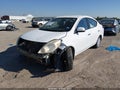 2012 Nissan Versa — photo 2 of 14 | VIN 3N1CN7AP1CL927828