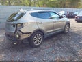 2014 Hyundai Santa Fe — photo 4 of 13 | VIN 5XYZU3LA3EG182635
