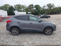 2014 Hyundai Tucson — photo 13 of 16 | VIN KM8JU3AG1EU870132