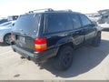 1998 Jeep Grand Cherokee — photo 4 of 16 | VIN 1J4GZ48SXWC275880