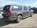 2010 Chevrolet Suburban 1500 — photo 4 of 21 | VIN 1GNUKJE31AR126702