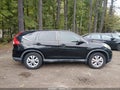 2015 Honda CR-V — photo 13 of 16 | VIN 2HKRM3H55FH512121