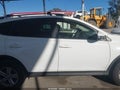 2014 Toyota RAV4 — photo 14 of 17 | VIN JTMWFREV3EJ007818