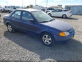 2000 Mazda Protege — photo 1 of 16 | VIN JM1BJ2213Y0212197