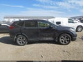2017 Honda CR-V — photo 13 of 16 | VIN 7FARW1H53HE010387