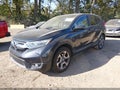 2017 Honda CR-V — photo 2 of 16 | VIN 7FARW1H53HE010387